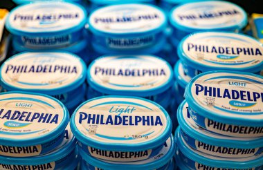 MUSCAT, OMAN - MAR 14, 2024: Philadelphia Cream Cheese put out for sale in a commercial refrigerator in a supermarket
