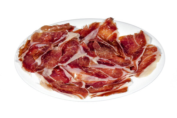 Serrano ham, ham, typical and delicious Spanish food, isolated background on white. Selective focus foreground