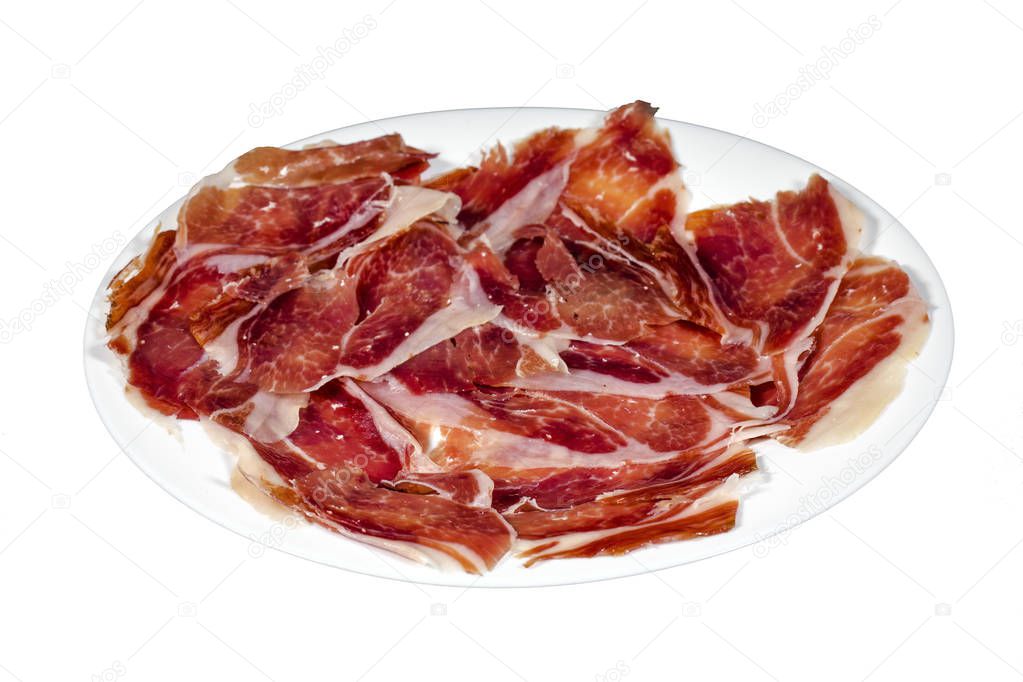 Serrano ham, ham, typical and delicious Spanish food, isolated background on white. Selective focus foreground