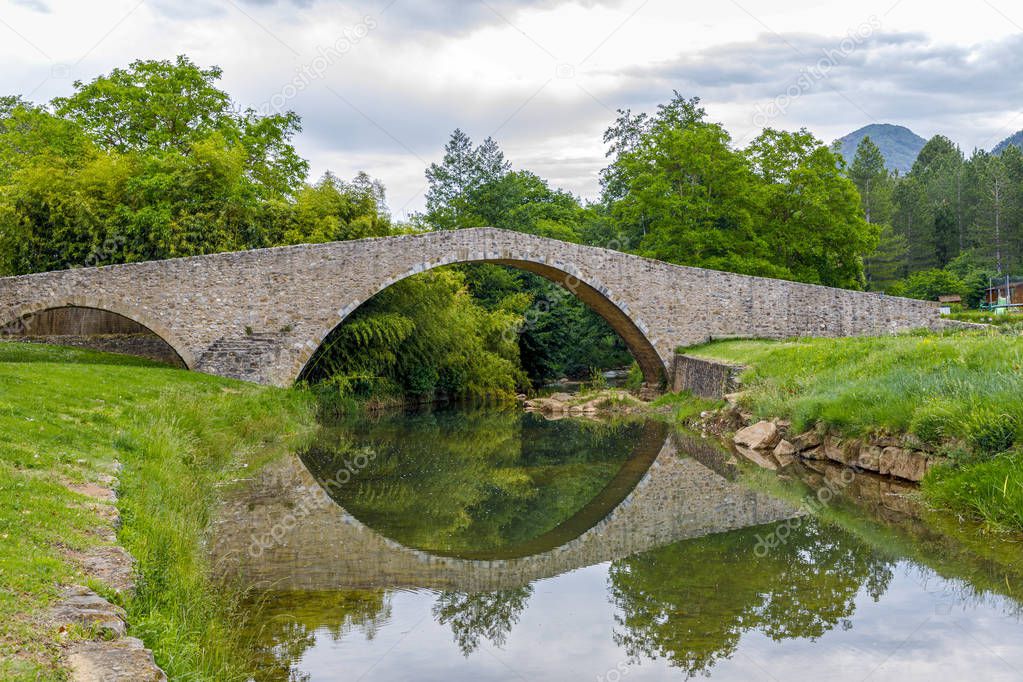 Medieval bridge over the Rialsesse river in Serres, France