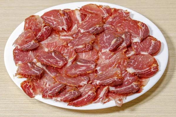 A lot of Spanish serrano ham iberico — Stock Photo, Image