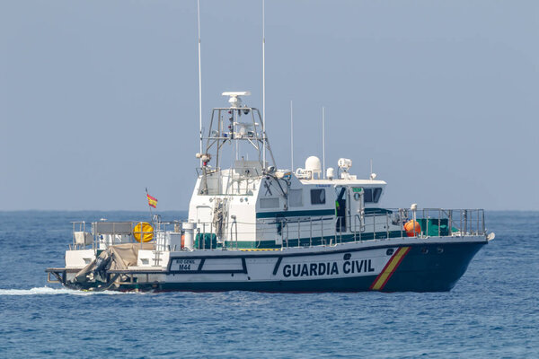 MOTRIL, GRANADA, SPAIN-JUN 11: Guardia Civil coast guard patrol taking part in an exhibition on the 12th international airshow of Motril on Jun 11, 2017, in Motril, Granada, Spain