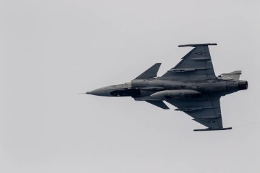 Motril, Granada, İspanya-Haziran 09: Uçak Saab Jas 39 Grippen katılan bir sergi 12 Uluslararası Havacılık tarihinde Motril üzerinde 09 Haziran 2017 yılında Motril, Granada, İspanya