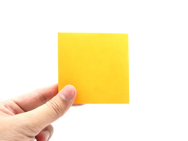 Hand Met Een Oranje Papier Stick Opmerking Geïsoleerd Een Witte — Stockfoto
