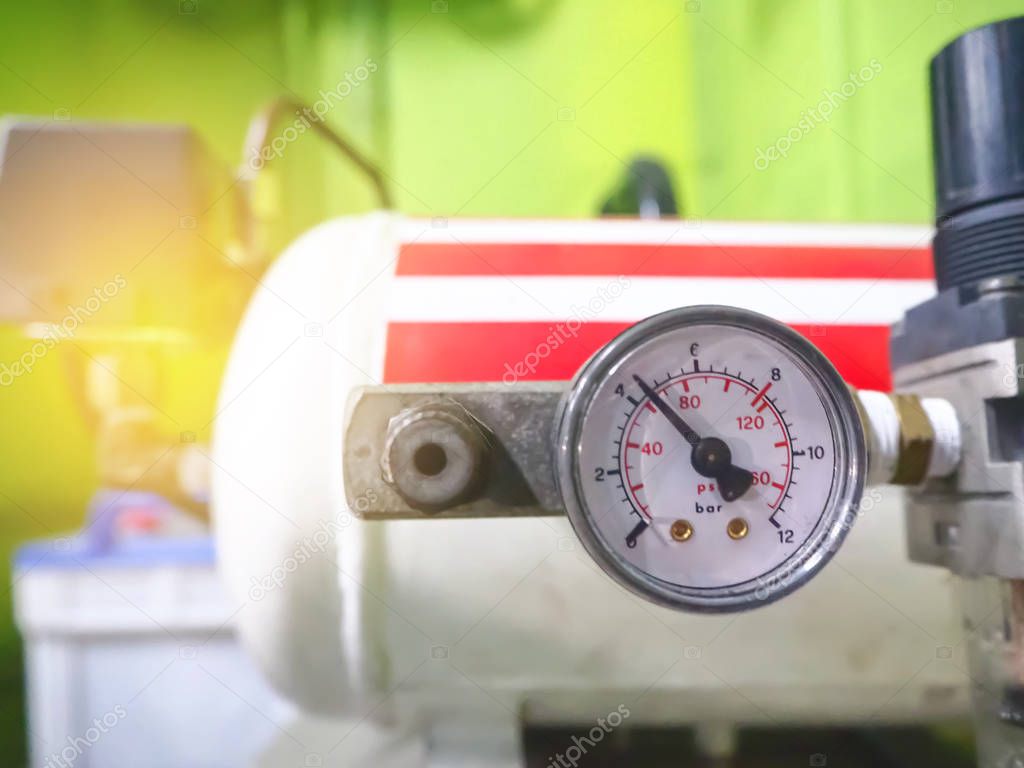 Close Up of air compressors pressure measurement pumps.