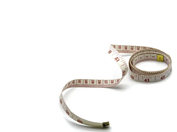 A soft tailor measuring tape isolated on a white background with — Stock Photo, Image