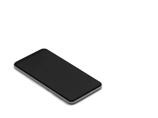 Uno smartphone isolato su uno sfondo bianco con spazio di copia . — Foto Stock