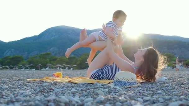 Young Mother Her Little Baby Girl Have Fun Sitting Beach — Stock Video