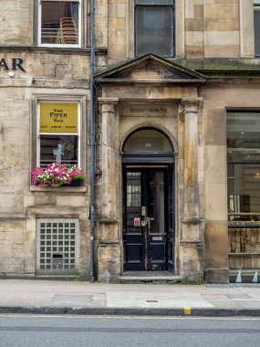 Glasgow, İskoçya - 21 Temmuz: 21 Temmuz 2017 Glasgow, İskoçya'da bulunan Piper çubuk. Piper Bar popüler bir pub ve viski bar George Square'karşısında olduğunu.