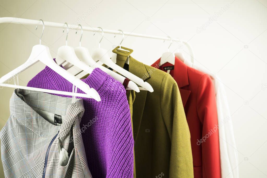Hanger with clothes on a white background