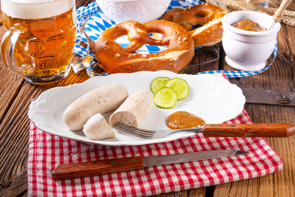 delicious bavarian oktoberfest white sausage with sweet mustard