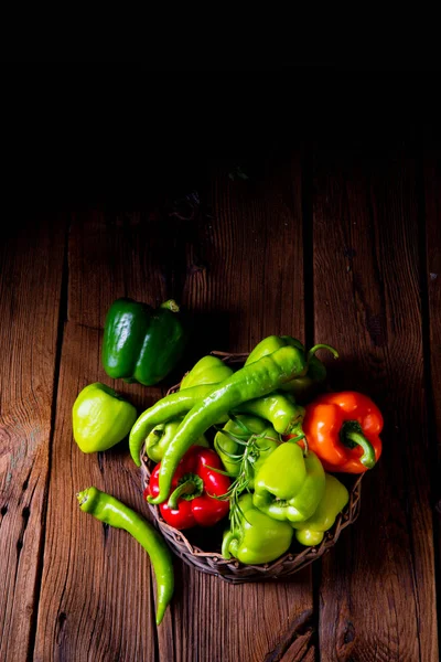 Various Harvested Peppers Hot Peppers Basket Wooden Background — Stock Photo, Image