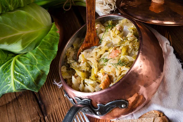 Young and fresh cabbage cooked with bacon cubes — Stock Image Young Fresh Cabbage Cooked Bacon Cubes Stock Photo