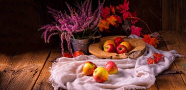 tasty European crab apples on rustic background clipart