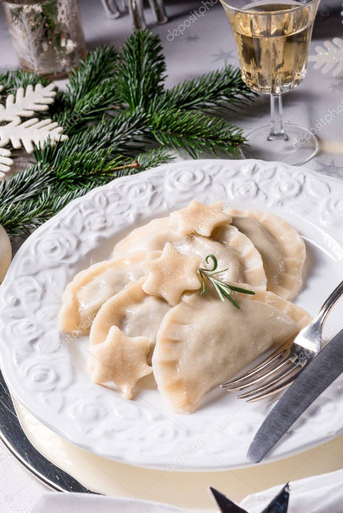 Polish style dumplings filled with sauerkraut and mushrooms