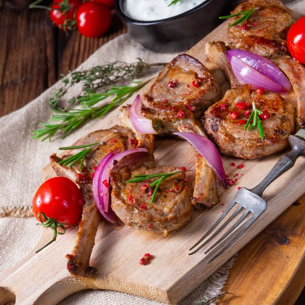 Tasty Lamb chops with mint and rosemary — Stock Photo, Image