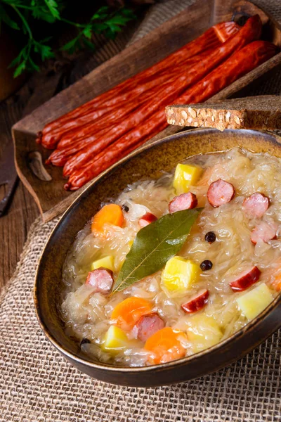 Sopa rústica de chucrut con tocino y salchicha —  Fotos de Stock