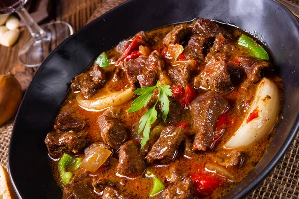 Classic beef goulash with peppers and onions — Stock Photo, Image