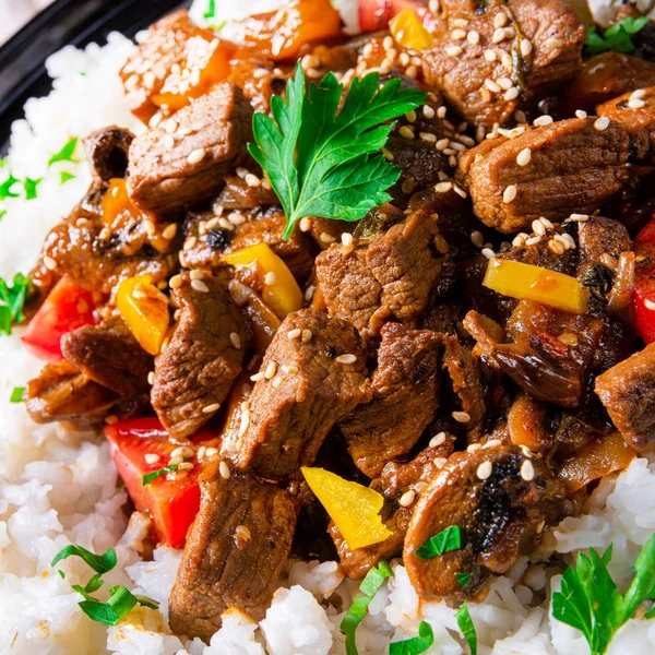 Tajin beef stew with rice paprika and sesame seeds — Stock Photo, Image