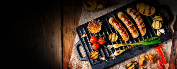 Delicious  grilled sausage with various grilled vegetables — Stock Photo, Image