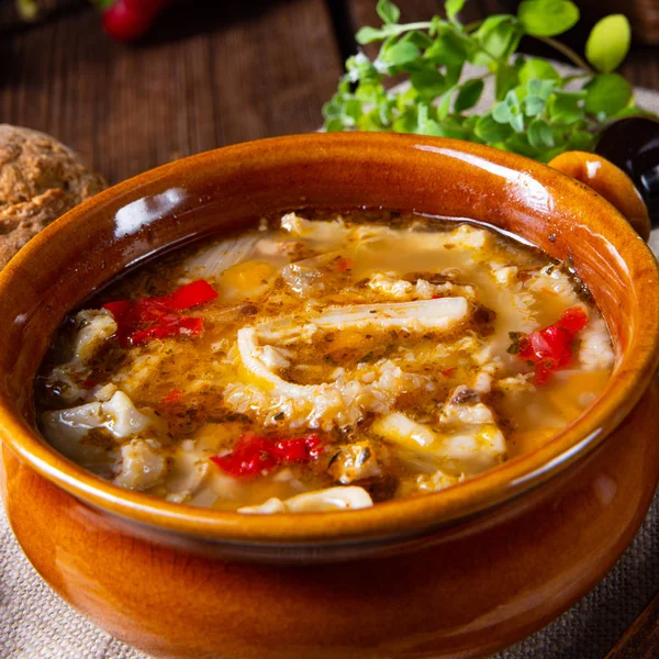 Rustic Spicy tripe soup with red paprika. — Stock Image Rustic Spicy tripe soup with red paprika. Royalty Free Stock Images