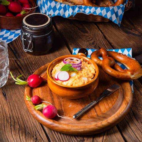 Rustic Bavarian obazda with radishes and onions — Stock Photo, Image