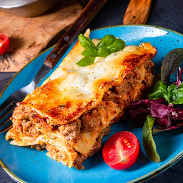 Spicy lasagne with tomato sauce and basil — Stock Photo, Image