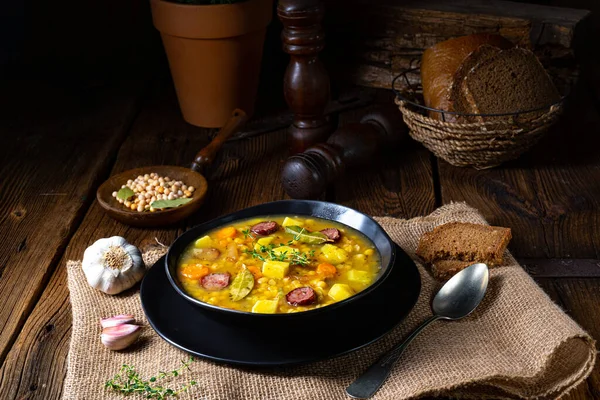 Rustic pea soup with bacon and sausages — Stock Image Rustic Pea Soup Bacon Sausages Stock Photo