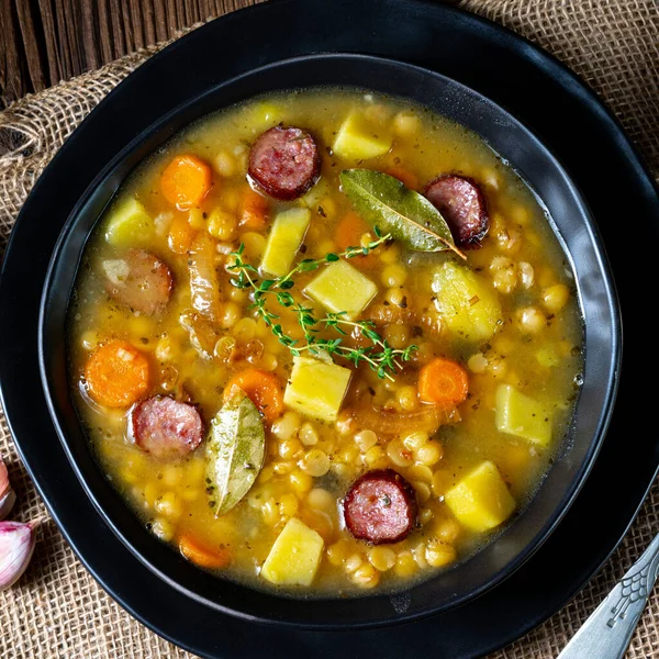 Rustic pea soup with bacon and sausages — Stock Image Rustic Pea Soup Bacon Sausages Stock Photo