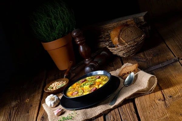 Rustic pea soup with bacon and sausages — Stock Image Rustic Pea Soup Bacon Sausages Stock Image
