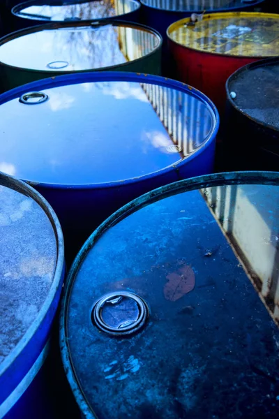 Reflection in water on old barrels — Stock Photo, Image