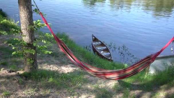 Bright Colorful Hammock Made Cloth Background Boat Blue River Gauja — ストック動画