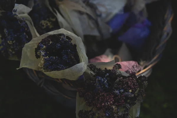 Bouquets of lavender in a basket at dusk — Stock Photo, Image