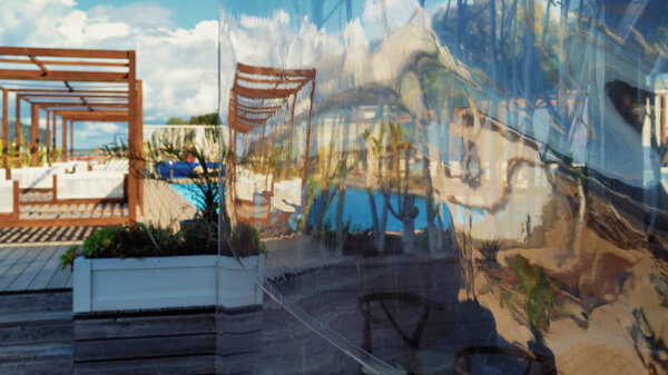 Summer cafe on the beach with a film