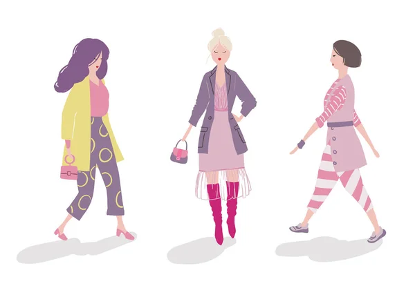Grupp fashionabla flickor promenader och poserar — Stock vektor
