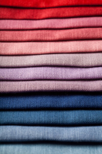 Detail close up of textured and colorful brand new fabrics