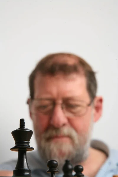 Mature Scandinavian Man Playing Chess — Stock Photo, Image