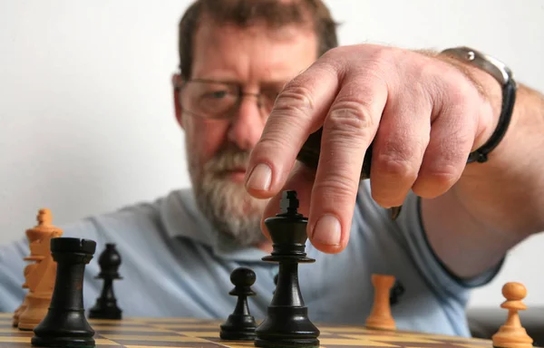 Mature Scandinavian Man Playing Chess — Stock Photo, Image