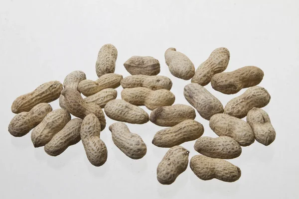 Many Peanuts White Background — Zdjęcie stockowe