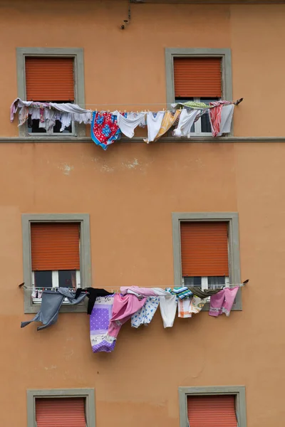 clothes hanging out to dry on a washing line  in Livorno on the Ligurian Sea on the western coast of Tuscany, Italy, 2011