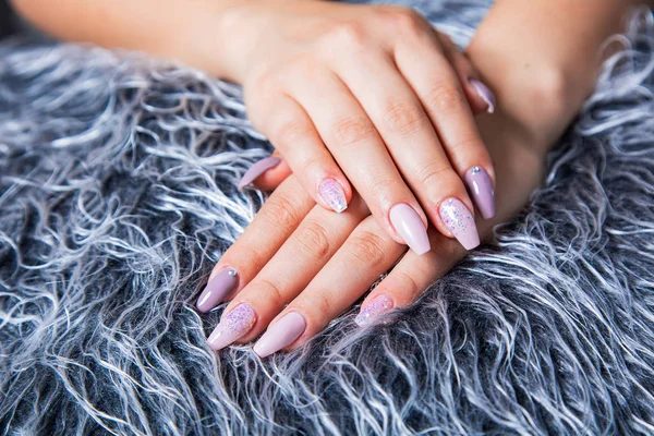 Perfect Manicure with Trendy Nail Art on Fake Gray Fur Pelt — Stock Photo, Image