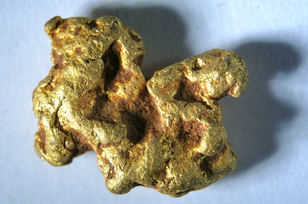 Gold nugget background close up — Stock Photo, Image