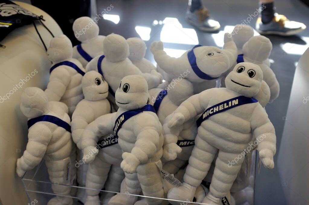 Clermont-Ferrand, France  September 4, 2019:  small Bibendum Michelin stuffed toys on sale in the shop at the museum exit