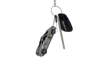 Döndürme tuşları biblo gibi araba ile animasyon. Anahtar taşı--dan alarm uzaktan ile yeni bir araba. Beyaz arka plan üzerinde 3D render