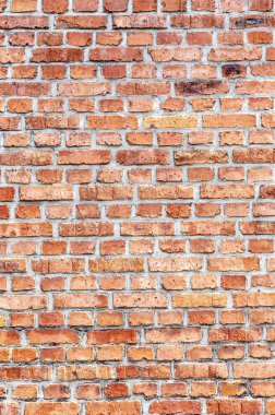 Harmonik arka plan olarak eski kırmızı tuğla duvar