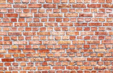 Harmonik arka plan olarak eski kırmızı tuğla duvar