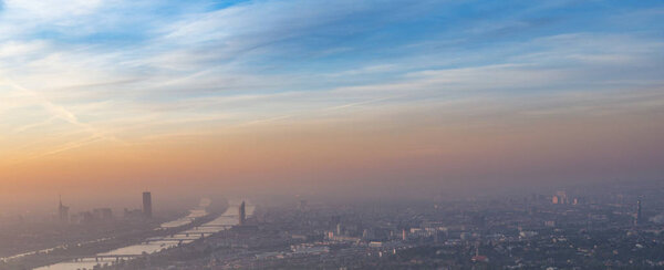 Panoramic view to city of Vienna with river Danube in sunrise