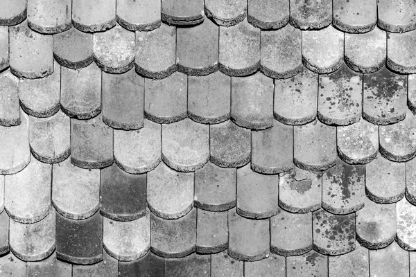 old tiles at the roof as harmonic background