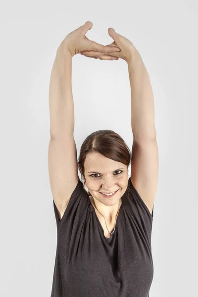 Frau Übt Hand Yoga Figuren Isoliert Auf Weiß — Stockfoto