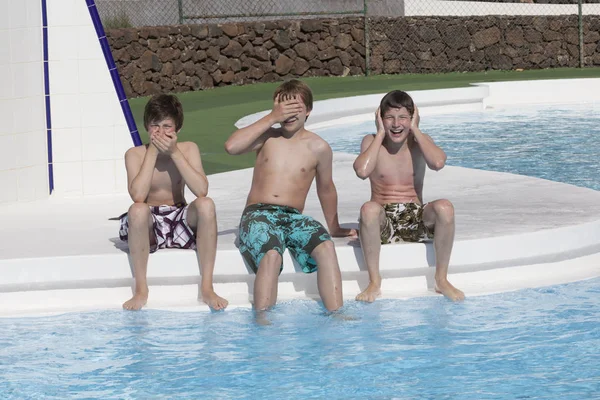 Boys Showing Three Monkeys Gesture Hearing Looking Speaking Blue Pool — Stock Photo, Image